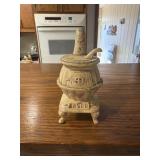 Miniature cast metal pot belly stove