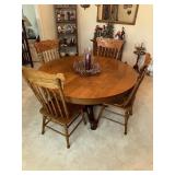 Round oak pedestal dining table and