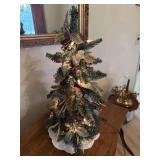 Small lighted Christmas tree