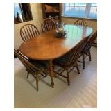 Oak dining table with 6 arrowback