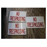 3 metal No Trespassing signs
