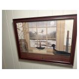 Framed Canadian geese flying over a winter scene
