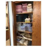 Contents of hallway closet - bath towels, hand