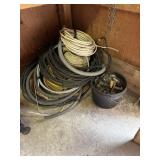 Lot of wire and bucket of pipe fittings