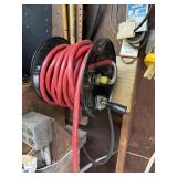 Air hose and reel (buyer must remove from wall)