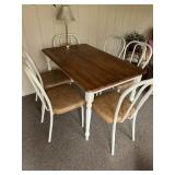 Dinette table with 6 chairs and a table lamp