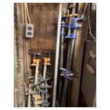 Lot of pipe clamps (in corner)