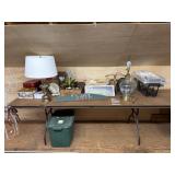 8 Foot folding table with contents - tins,baskets,