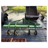 John Deere tow behind dethatcher