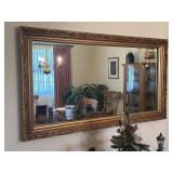 Gold frame wall mirror
