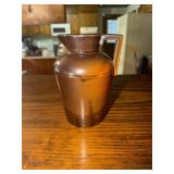 Glazed stoneware pitcher signed on bottom