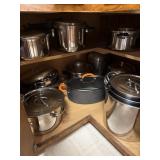 Lower cabinet contents including roasters,