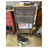 Metal cabinet with 2 drawers and tire chains