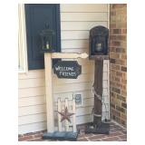 Wooden Welcome Friends lamp post sign and a