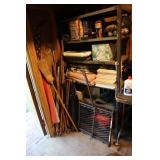 Metal shelf with contents including chair