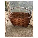 Basket for magazines or books and a floor lamp