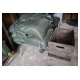 Lot of bags of sand with rolling cart and Suburban