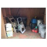 Contents of open shed by driveway including