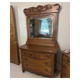 Oak 4 drawer dresser with beveled glass mirror