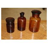 3 brown glass apothecary jars (one marked Baker