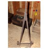 Red Metal Box and an Antique Iron Wheeled Hand