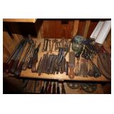 Shelf Lot including Horseshoes, Chisels, Push