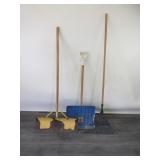 Two Snow Shovels and a Rake
