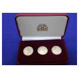 3- Morgan Silver Dollars