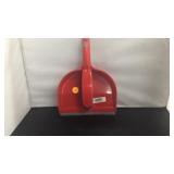 Dust pan with a hand brush