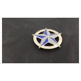 Silver and blue belt buckle