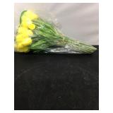 Yellow plastic tulips bundle