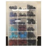 Plastic tray with assorted size caps