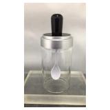 Glass jar with spoon