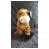 Plush sitting horse