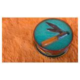 Orange Barlow knife in metal tin