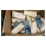 Box full of blue glasses