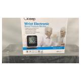 Wrist electronic blood pressure monitor