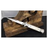 Stiletto style with pearl handle