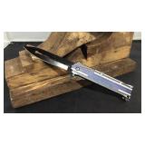 The thin blue line thumb assist knife