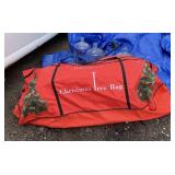 CHRISTMAS TREE IN RED BAG