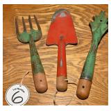 Three vintage press steel garden tools