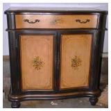 A Bow Front Cabinet