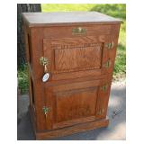 An Oak Polar Bear Refrigerator