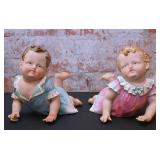 Pair of Bisque  Porcelain Piano Babies