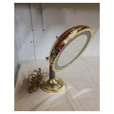 Lighted vanity magnifying mirror works Lighted vanity magnifying mirror works