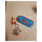Set of collectible Tigger glasses, keychain, and Set of collectible Tigger glasses, keychain, and
