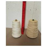 Commercial size spools of thread