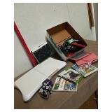 Wii Fit board with games and more