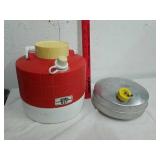 Vintage metal canteen with thermos jug