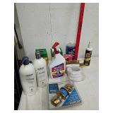 Group of household supplies includes shampoo and